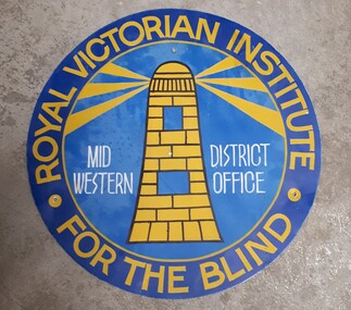 Blue and yellow round sign with lighthouse