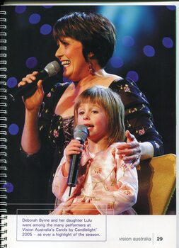 Deborah Byrne and her daughter Lulu on stage at Carols by Candlelight