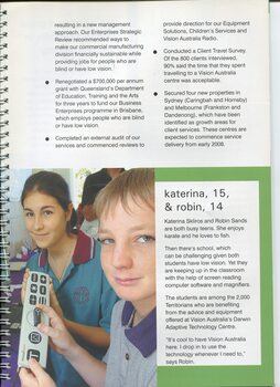 Two teenagers holding adaptive equipment as they look towards the camera