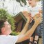 Cooper Hallcroft held by his father Aaron in Wagga Wagga