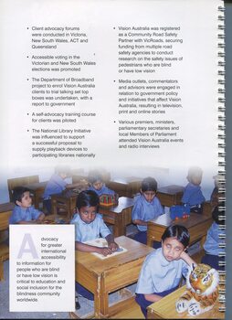 Seven schoolboys at wooden desks with a variety of objects in front of them