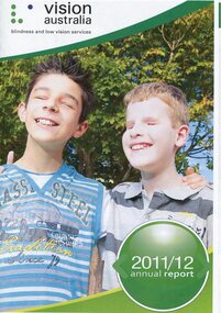 Two schoolboys, James and Riley, put an arm around each other's shoulders and turn towards camera
