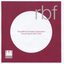Front cover of white circle on maroon background with maroon and grey writing