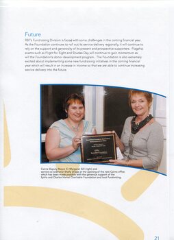Acknowledgement of future fundraising issues and image of Cr Margaret Gill and Shelly Drage holding plaque for opening of Cairns office
