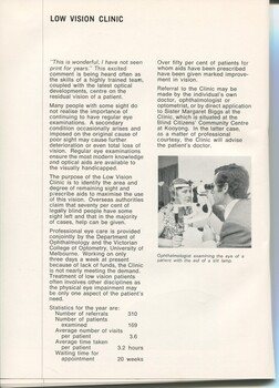 Overview of the Low Vision clinic. Man examines a women's eye using a slit lamp.