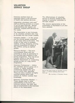 Overview of Volunteer Service group.  Woman assists another exit a car.