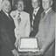 Hubert Opperman, Bruce Small, Bob Pearson and Arthur Wilkins around a cake with 80 written on it.