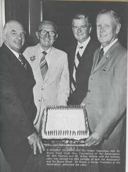 Hubert Opperman, Bruce Small, Bob Pearson and Arthur Wilkins around a cake with 80 written on it.