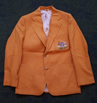 Gold suit jacket with kangaroo/emu coat of arms on left breast pocket