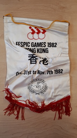 White satin mini banner with black writing and red fringing