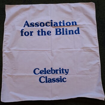 White cotton tablecloth with blue writing