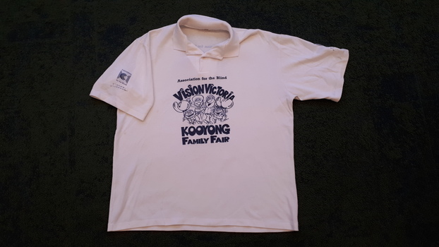 White polo shirt with blue writing 'Association for the Blind' Vision Victoria Kooyong Family Fair - front view
