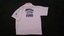 White polo shirt with blue writing 'Association for the Blind' Vision Victoria Kooyong Family Fair - rear view