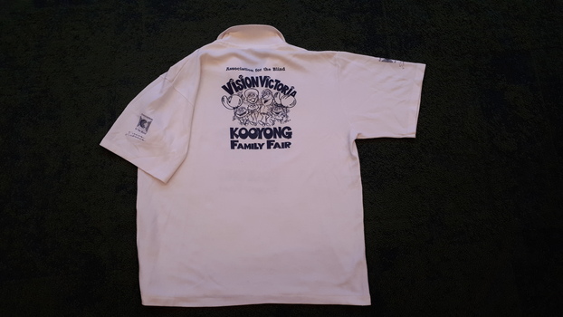 White polo shirt with blue writing 'Association for the Blind' Vision Victoria Kooyong Family Fair - rear view