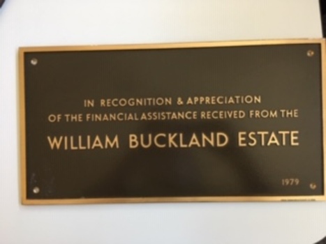 Brown plaque with raised copper letters