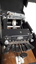 Six oval keys and one round key attached to embosser inside black vinyl case