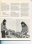Two females adjust tapette copying machines