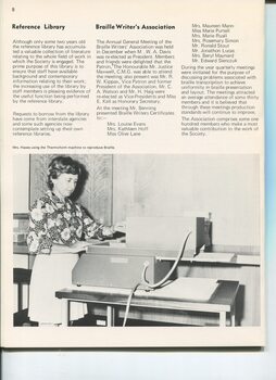 Mrs Hawes using a thermoform machine for Braille