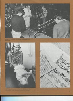 Four men on the cycle production line, a woman holds a baby by the legs as she rolls on the table and enlarged sheet music