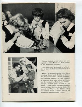 Group of school girls learning to sew and man signs a soccer ball for a school boy with nurse looking on