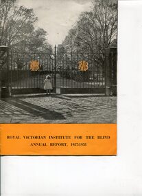 Young girl pushing open gates at St Kilda Road