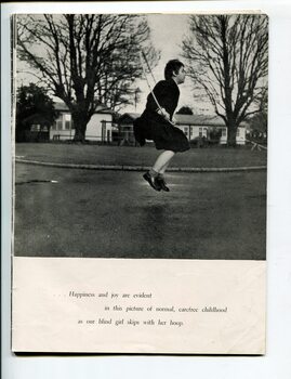 Schoolgirl skipping with a hula hoop