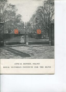 Young girl pushing open gates at St Kilda Road