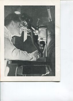 Ophthalmologist examining a woman's eyes