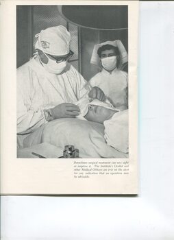 Doctor and nurse in operating theatre with patient on the table