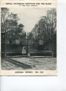 Young girl pushing open gates at St Kilda Road