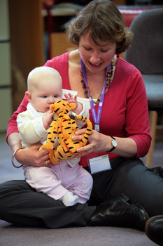 Baby Jessica plays with a Tigger soft toy held by ? Larsen