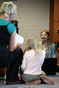 Trish Anderson with her daughters in the Feelix library