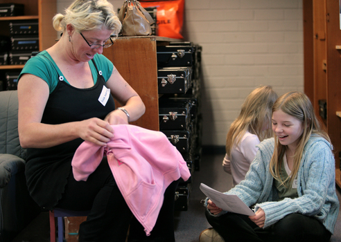 Trish Anderson with her daughters in the Feelix library