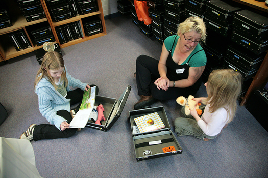 Trish Anderson with her daughters in the Feelix library