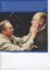 Neil Maxwell feeling the wax face of Prime Minister John Howard