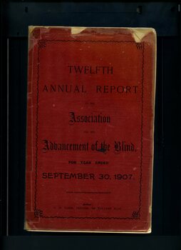 Red front cover with black writing