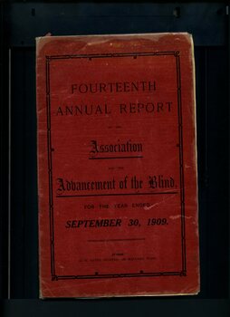 Red front cover with black writing