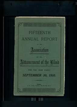 Green front cover with edging and detail on bottom edge