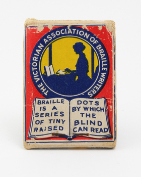 Female profile with brailler with 'The Victorian Association of Braille Writers' haloed around her and an open book