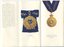 Pamphlet with image of the Order of Australia on the cover and discussion of medal inside