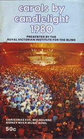 Crowd under spotlights, facing the stage