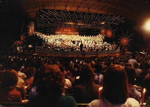 View of choir and orchestra on stage from the left-hand side of the audience