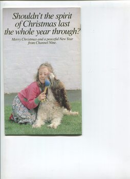 Girl cuddling dog and Christmas message from Channel 9