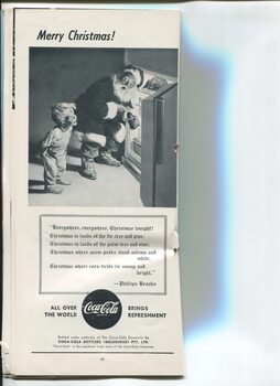 Christmas message from Coca-Cola and illustration of boy catching Santa get a Coke from his fridge