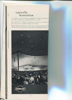 Dunlop advertisement and photo of audience watching stage during Carols