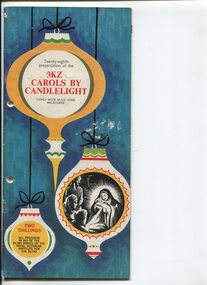 Drawing of three Christmas baubles with words in upper and lower and drawing of Christ's birth in middle