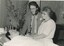 A man and woman with Barry Farnsworth prior to the ceremony