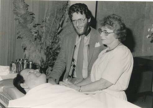 A man and woman with Barry Farnsworth prior to the ceremony