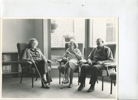 A group of residents sitting inside the George Vowell centre
