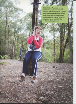 Cody riding on a flying fox in the bush